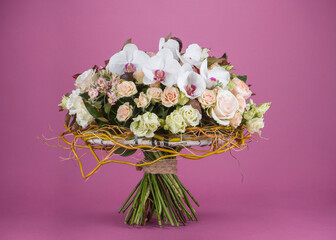 bouquet of pink roses on the purple background