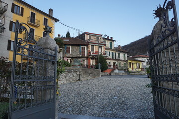 Fototapeta premium narrow street in ticino with colorful buildings