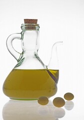 Olive, olea europaea, and Olive Oil against White Background