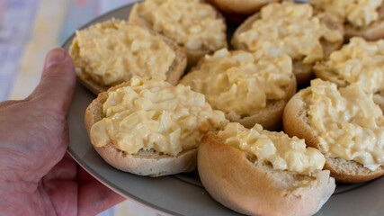 plate of bread rolls with egg mayonnaise 