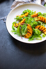 grilled peach salad lettuce leaves mix nectarine ingredient organic eating healthy top view place for text copy space keto or paleo diet raw