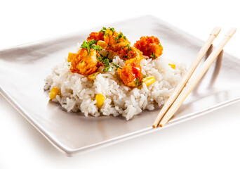 Chicken nuggets with rice on white background