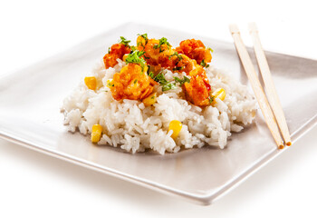 Chicken nuggets with rice on white background