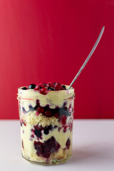 Vanilla custard trifle in mason jar 