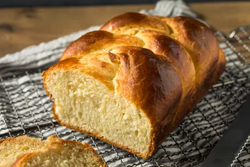 Fotobehang Homemade Baked Braided Brioche Bread © Brent Hofacker