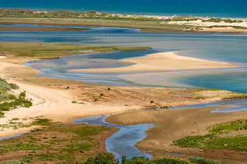 low tide at Cacela Velha beach in the Ria Formosa Natural Park, Algarve, Portugal