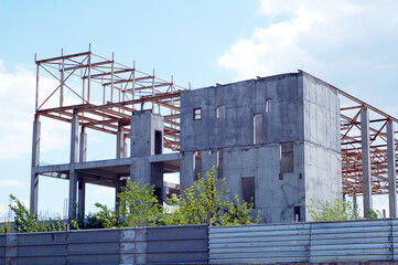 Fototapeta na wymiar Abandoned construction of a sports facility in the city.