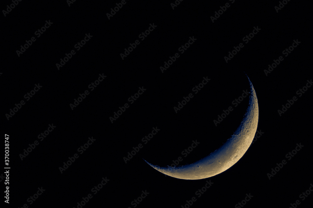 Canvas Prints telescope view of a thin crescent moon