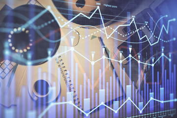 Multi exposure of forex chart drawing and work table top veiw. Concept of financial analysis.