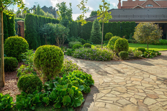Amazing garden with perennials and "dry stream" and  typical  pavilion    in russian   prosperous village. - so named Belgian village