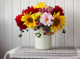 bouquet of sunflowers and red dahlias.