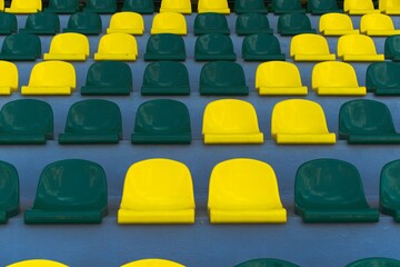 yellow and green seats for fans at the stadium