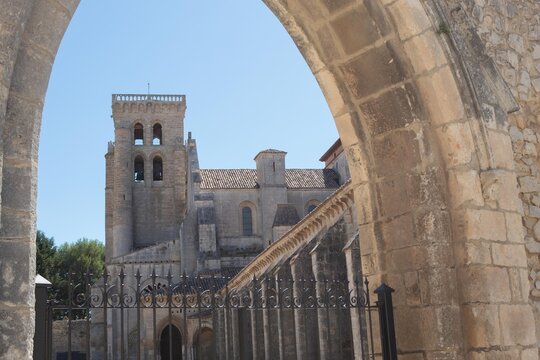 BURGOS, SPAIN - 05 AUGUST - 2020: Santa María la Real de Las Huelgas Abbey, monastery in Burgos, Spain seen through an arch and gate
