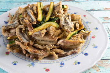 Fried fresh anchovies and zucchini