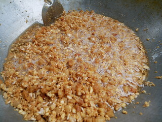 Fry mixed garlic and pork on hot pan, preparation for food cooking , local thai food .
