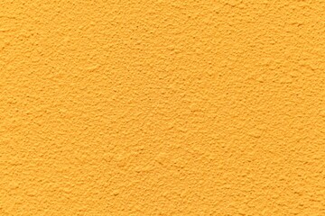 Fototapeta premium Patterned cement wall Vintage yellow painted texture and background