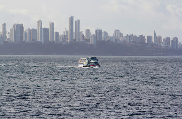 salvador, bahia / brazil - november 3, 2014: motorboat is seen sailing through Baia de Todos os...