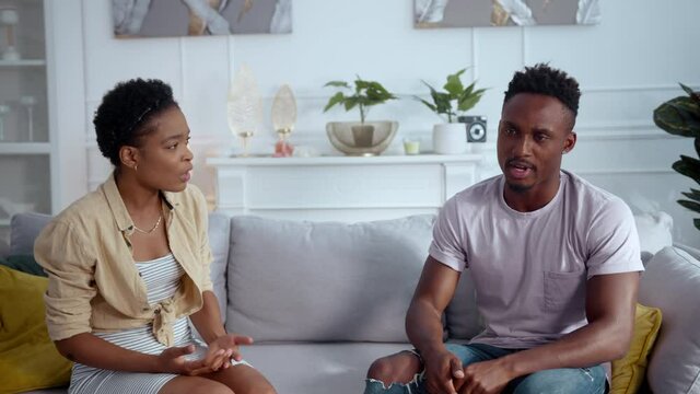Family crisis. Young afro-american dating upset woman and man angry about conflict quarrelling various problems having lack of respect. Relationship problem.