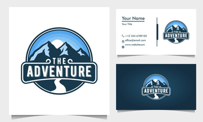 badge adventure logo design with blue mountains and road and sunrise, with business card template