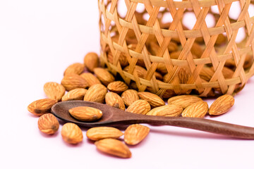 Almonds in round bamboo basket