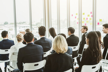 Group of business people meeting in a seminar conference . Audience listening to instructor in...