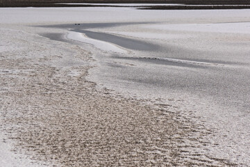 The beautiful frozen sea with white snow.