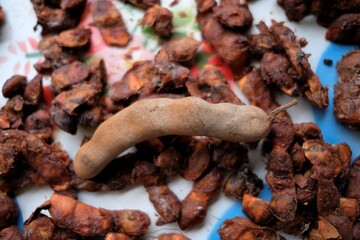 Photo of raw tamarind fruits