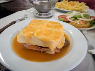 Francesinha is a Portuguese sandwich originally from Porto,