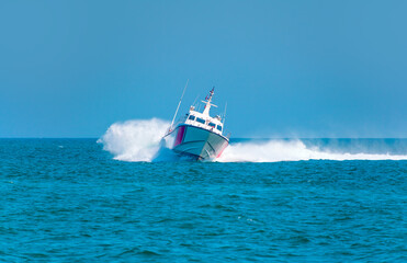 Coast Guard patrol boat rushing to the rescue