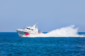 Coast Guard patrol boat rushing to the rescue