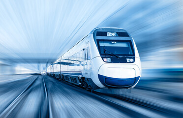 High speed train runs on rail tracks . Train in motion