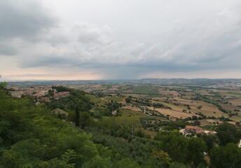 Fototapeta na wymiar Panoramic view from Recanati, city of the infinity, with summer storm in the Marche region
