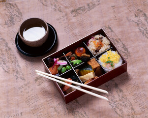 Fototapeta na wymiar sushi with chopsticks