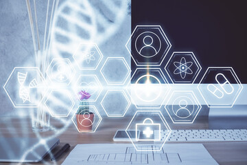 Desktop computer background and DNA drawing. Double exposure. Science concept.