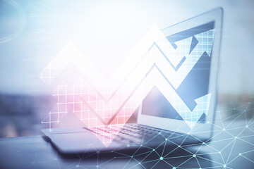 Computer on desktop with point up arrows hologram. Double exposure. Concept of success.