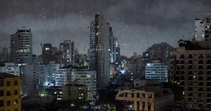 Big city on a rainy night. View from the buildings of the city and the rain running down outside of the window. Animation.