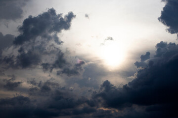 Naklejka na ściany i meble Background of dark clouds before a thunder-storm.