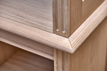 Modern joinery. Wooden bookcases in process of production in workshop. Furniture manufacture
