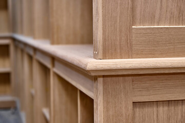 Modern joinery. Wooden bookcases in process of production in workshop. Furniture manufacture