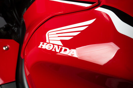 Logo on the red honda motorcycle, gas tank details