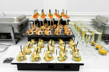 Festive buffet table with many snacks and appetizers