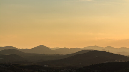 Beautiful mountain range landscape in a small village in Cyprus during sunset 