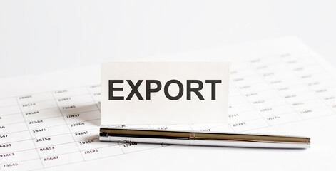 Text EXPORT on stickers,pen on the background of documents. Financial bookkeeping, Accounting Concept. Top view.