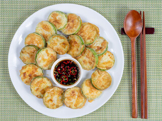 Korean food : Hobakjeon. Zucchini sliced, flour-coated, and pan-fried in egg batter.