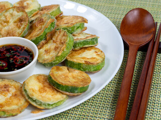 Korean food : Hobakjeon. Zucchini sliced, flour-coated, and pan-fried in egg batter.