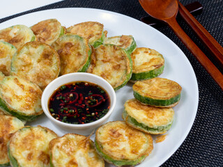 Korean food : Hobakjeon. Zucchini sliced, flour-coated, and pan-fried in egg batter.