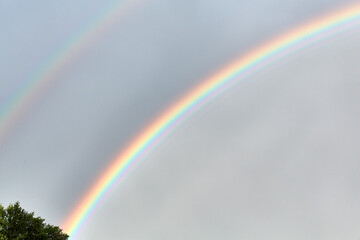 Double rainbow in the sky after rain