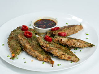 Korean food : Kkaennipjeon. Half-folded perilla leaves stuffed with a mixture of minced meat and vegetables, egg-battered, and pan-fried.  Korean ritual food usually eaten on holidays.