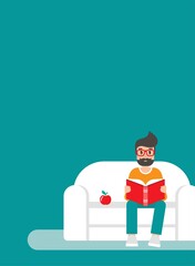 man with glasses and red book siting on sofa with apple and stack of books. creative student.