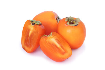 Two persimmons with two half  isolated on white background